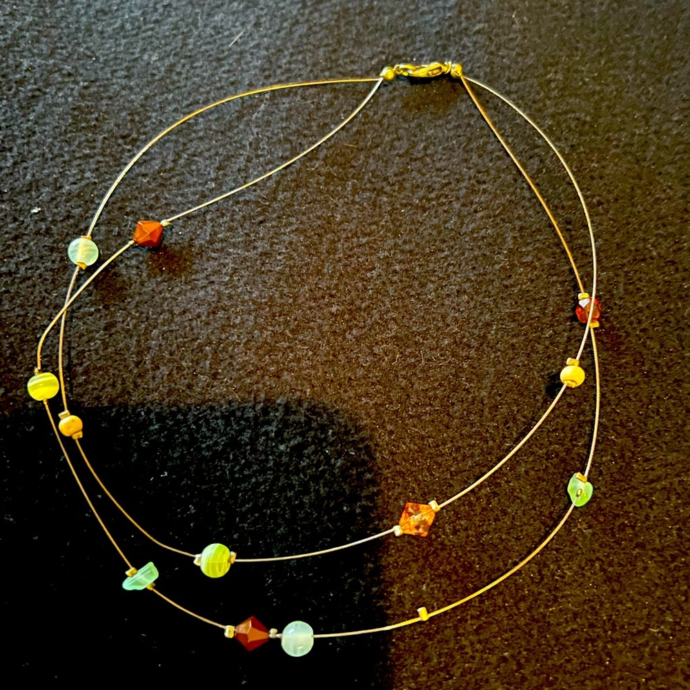 Women’s choker style necklace with multi color stones